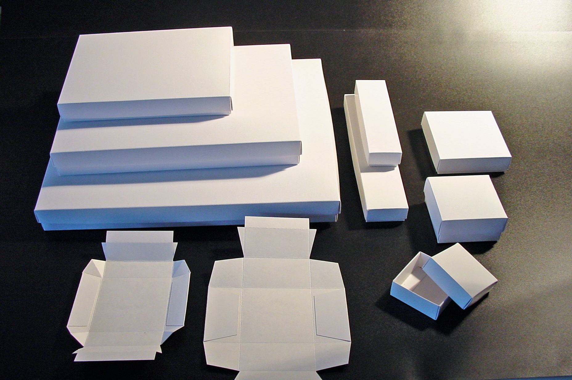 carton compact plat avantage caractéristique blanc kraft