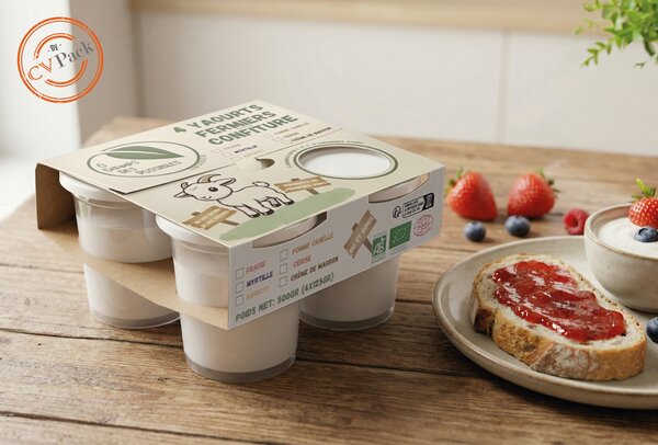 un exemple de groupeur en carton pour yaourt sur une table de petit dej